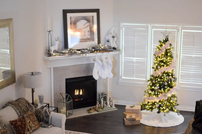 tree in white room near the fireplace